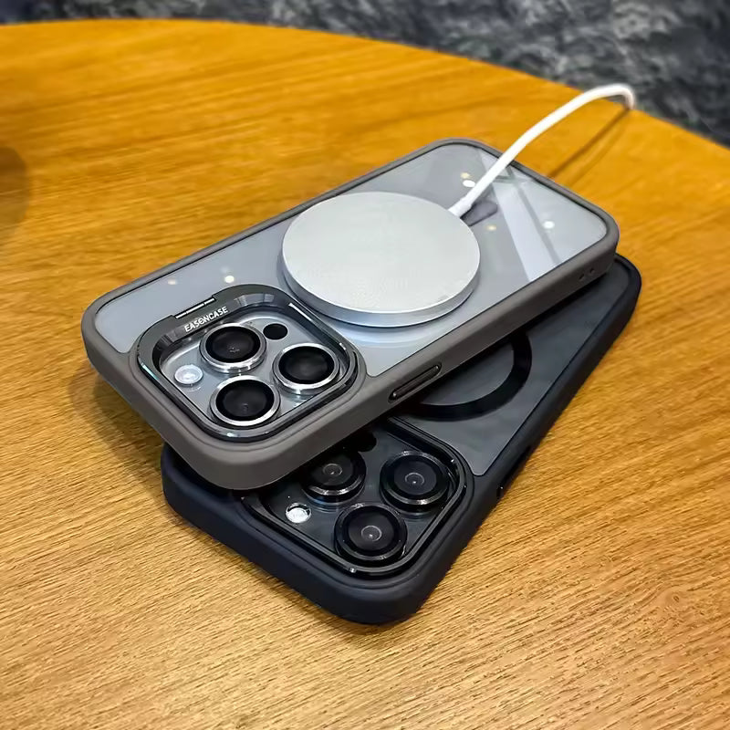 Two smartphones on a wooden surface with a white cable connecting them.