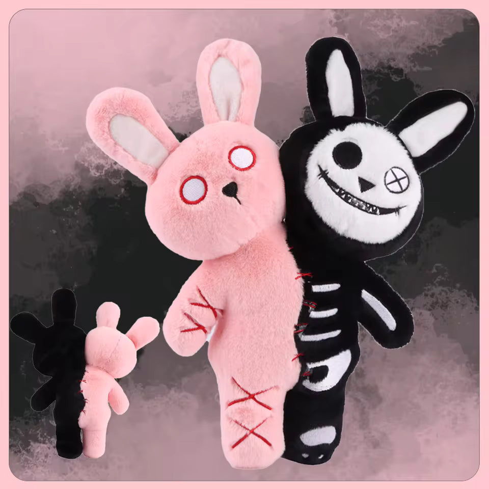 Pink and black plush toys with unique designs on a pink and gray background