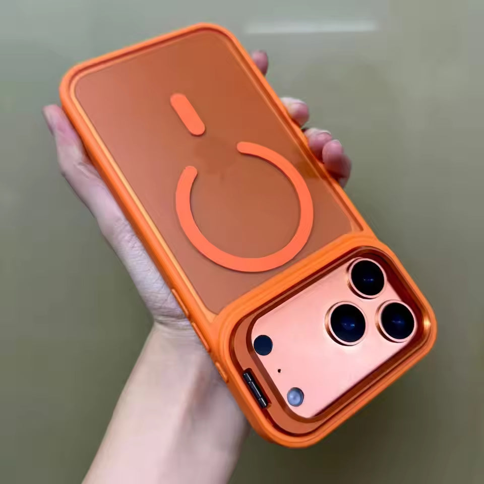 Orange phone case with a unique design held by a hand against a neutral background