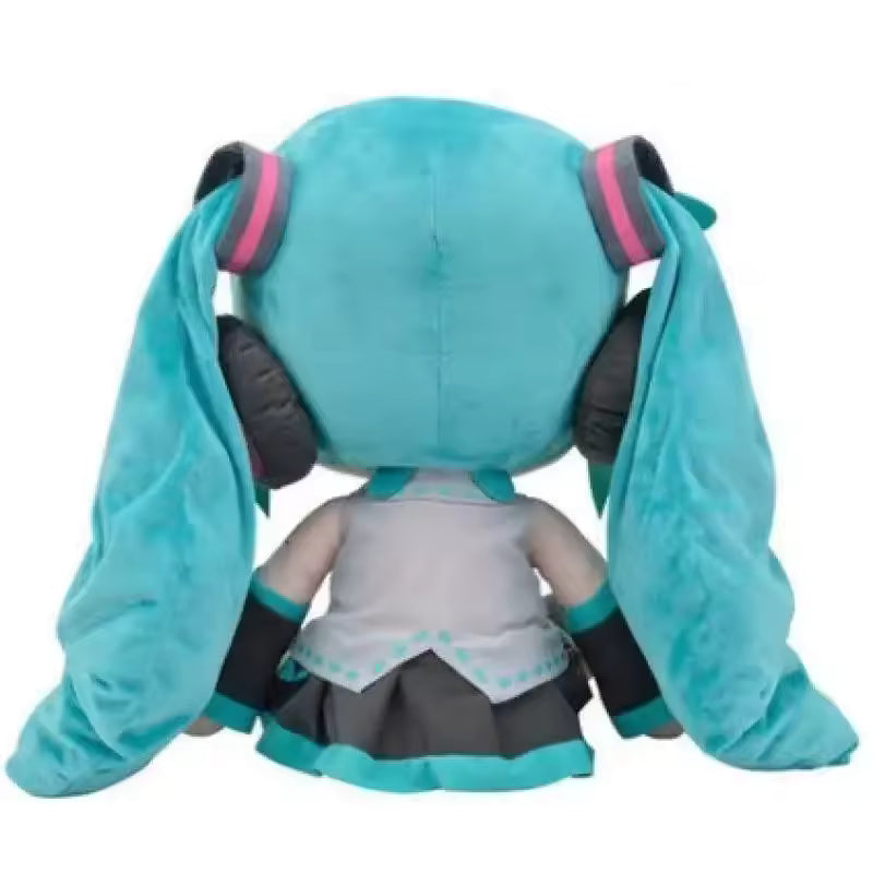 Plush toy with teal hair and black headphones on a white background