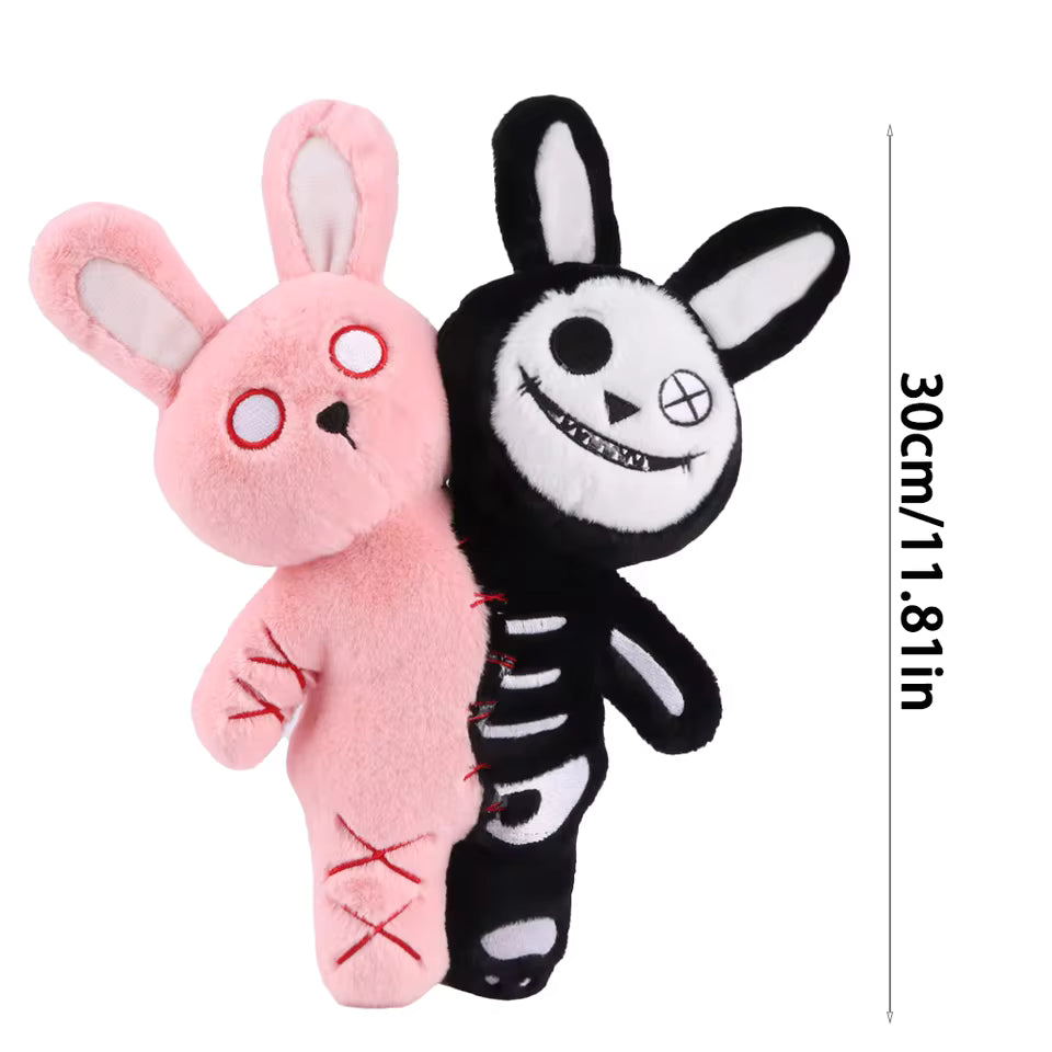 Pink and black plush toys resembling bunnies on a white background with a measurement label.