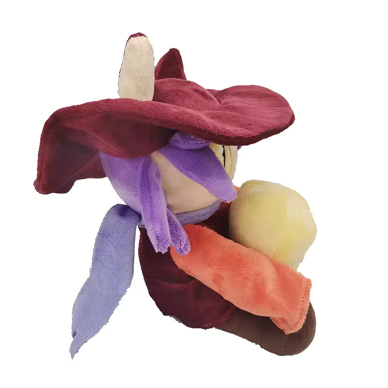 Colorful plush toy with a maroon hat and various other colors on a white background